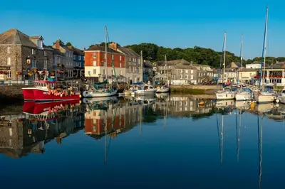 a group of boats are docked in a harbor at 4 Bed in Newquay oc-s34623 in Saint Columb Major