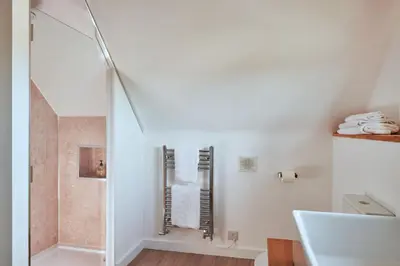 a bathroom with a shower and a sink at Finest Retreats - Templemore in Widemouth Bay