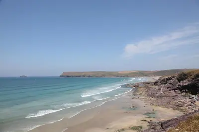 a view of a beach with the ocean at St Moritz Hotel and Cowshed Spa in Polzeath