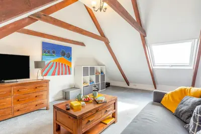 a living room with a couch and a tv at 2 Bed in Newquay oc-j32859 in Newquay