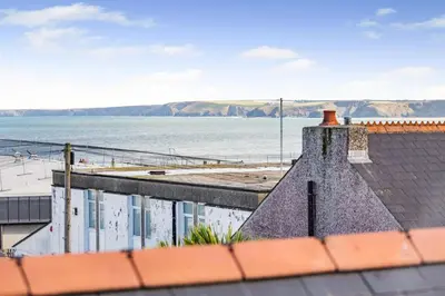 a view of the beach from the roof of a building at 2 Bed in Newquay oc-j32859 in Newquay