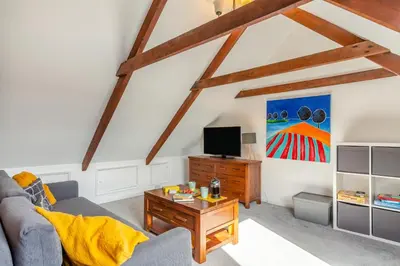 a living room with a couch and a tv at 2 Bed in Newquay oc-j32859 in Newquay