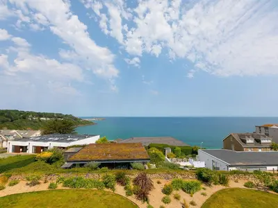 an aerial view of a house and the ocean at Mid Air in St Ives