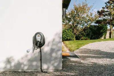 a house with a phone plugged into a wall at Allora in Carbis Bay