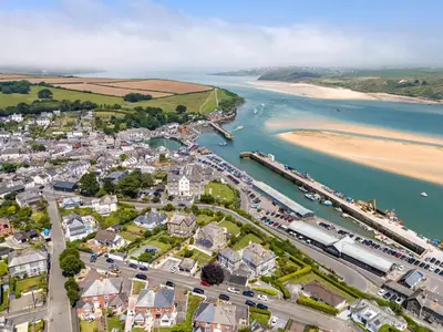 an aerial view of a town next to a beach at 2 Bed in Padstow oc-28108 in Padstow