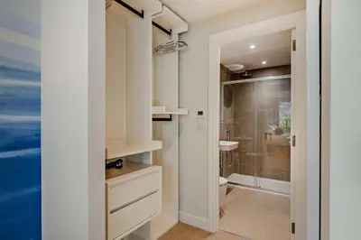 a bathroom with a shower and a toilet and a sink at 2 Bed in Padstow oc-28108 in Padstow
