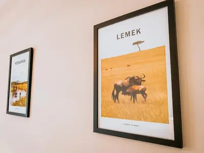 a framed picture of a camel and a tree in a field at Twiga Cottage - Quiet 2 bed - Heart of town - Walk to beaches in Newquay