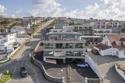 an aerial view of a house in a city at Groundfloor Apartment Opposite Beach with Parking in Newquay