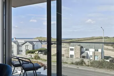a view from the window of a house at Apartment Balcony with Expansive Sea Views Parking in Newquay