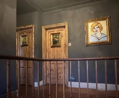 a room with two doors and a painting on the wall at Tin Miners Captain Georgian hs, parking, Logburner in Camborne