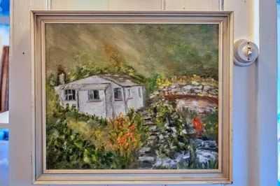 a painting of a painting of a house and flowers at Finest Retreats - Millook Water in Poundstock