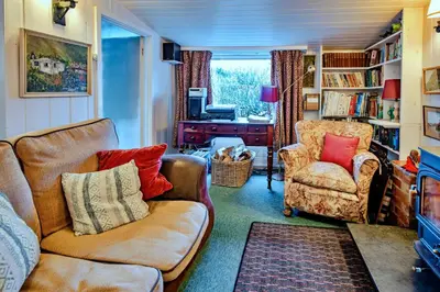 a living room with a couch and two chairs at Finest Retreats - Millook Water in Poundstock