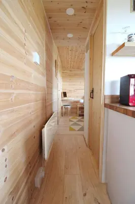 a hallway in a house with wood paneling at Holiday Home für 1 Personen - 1 Kind ca- 33 m² in Ludgvan- Cornwall by Interhome in Ludgvan