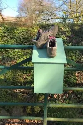 a pair of shoes sitting on top of a bench at Holiday Home Idyllisches-haustierfreundliches Landhaus Lavender by Interhome in Liskeard