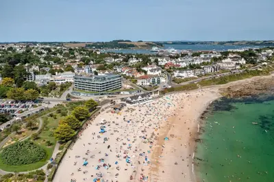 an overhead view of a beach with people on it at Scandi Style Apartment in Central Falmouth in Falmouth