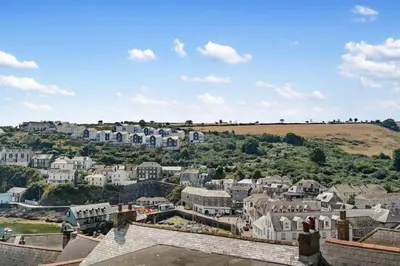 a view of a town from the roof of a building at Beautiful Cottage Minutes from Mevagissey Harbour in Mevagissey