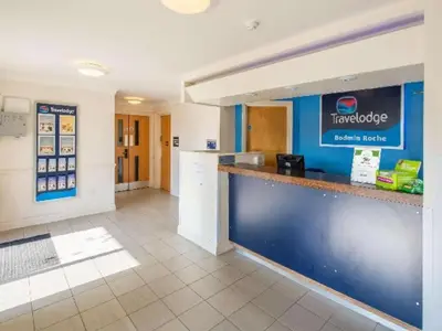a waiting area of a fast food restaurant with a counter at Travelodge Bodmin Roche in Roche