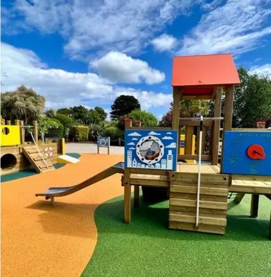 a park with a playground with a slide at The Crab Shack in Tywardreath