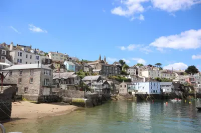 a view of a town with a river and houses at Rowan Cottage - sleeps 2 - Nr Looe and Polperro in Lanreath