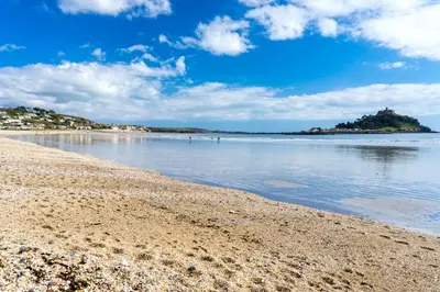 a view of the beach on a sunny day at Trekenna close to Marazion and Praa Sands in Saint Hilary