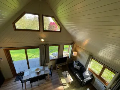 an overhead view of a room with a table and chairs at RoseTree Lodge 3 bed Sleeps 6 in Michaelstow