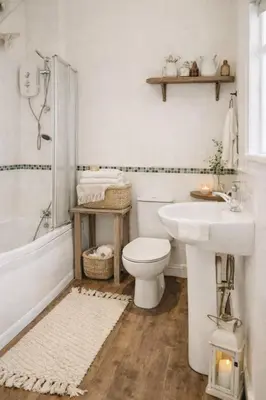 a bathroom with a toilet and a sink and a shower at The Little Lobster in Porthleven
