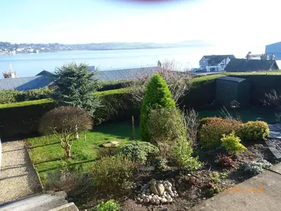 a garden with a view of the water at No 1 Exbury Padstow in Padstow