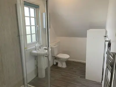 a bathroom with a toilet and a sink at Cosy 3 bedroon chalet close to Hayle, 40 Tudor Court in Hayle