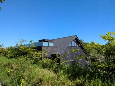 a house on top of a hill at Cober Riverside Retreat - Luxury Barn Apartment in The Heart of Cornwall in Wendron