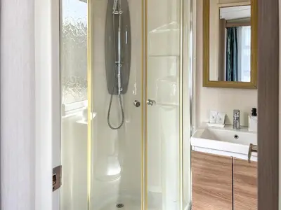 a bathroom with a shower and a sink at Valley View - Uk50320 in Liskeard