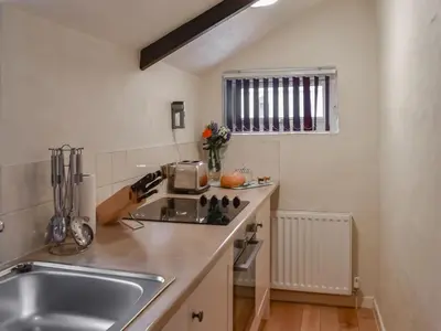 a kitchen with a sink and a counter top at Henhouse - Uk49016 in Liskeard