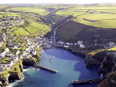 an aerial view of a town and a river at Homelands in Port Isaac