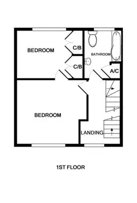 a black and white floor plan of a house at Poplar Cottage in Port Isaac