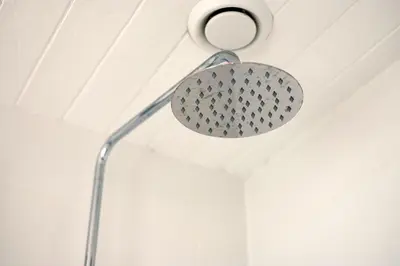 a metal light fixture on a ceiling at Portcor in Port Isaac