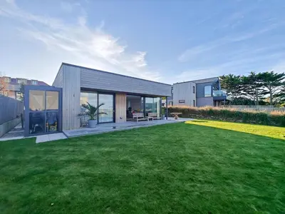 a house with a large yard with a large lawn at 3 Bed in Constantine Bay oc-t34218 in St Merryn