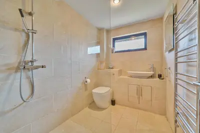 a bathroom with a shower and a toilet and a sink at 2 Bed in Tresarrett oc-b34255 in Blisland