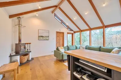 a living room with a couch and a stove at 2 Bed in Tresarrett oc-b34255 in Blisland