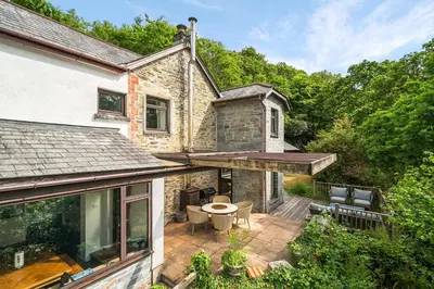 an aerial view of a house with a patio at 4 Bed in Tresarrett oc-b34254 in Blisland