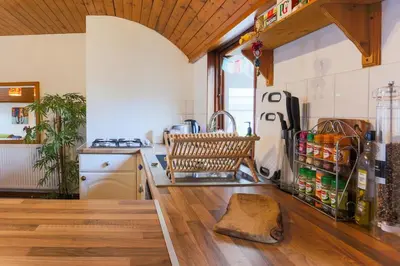 a kitchen with a sink and a counter top at Cosy Flat in the centre of St Ives in St Ives