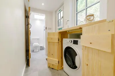 a laundry room with a washer and dryer at 2 Bed in St. Agnes oc-h27472 in St. Agnes
