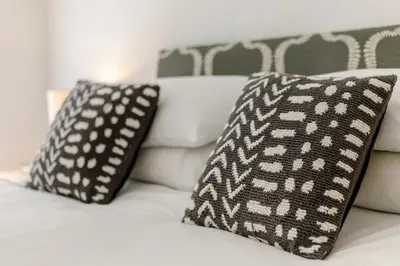 two black and white pillows on a white couch at 2 Bed in St. Agnes oc-h27472 in St. Agnes