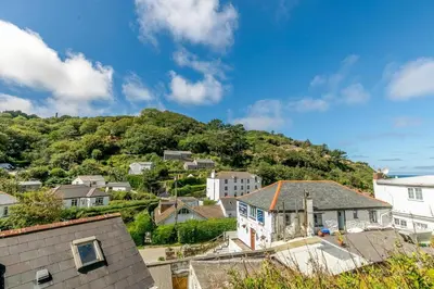 a view of a town with a hill in the background at 2 Bed in St. Agnes oc-h27472 in St. Agnes
