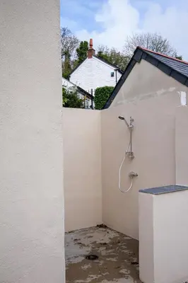 a bathroom with a shower in a wall at Tramanda a rural retreat to explore Bodmin Moor in Blisland