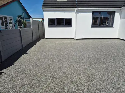 a driveway in front of a white house at Hove Too in Saint Day
