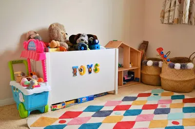 a white cabinet with stuffed toys on top of it at Goonrea in Looe