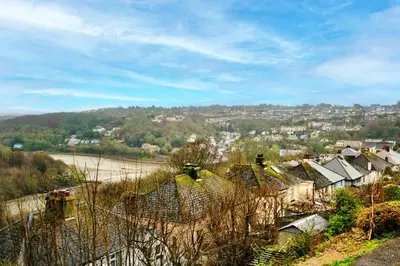 a view of a village with houses and a city at Goonrea in Looe