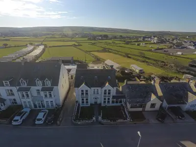 an aerial view of houses in a residential neighborhood at Bosayne Guest House in Tintagel