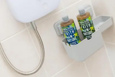 a bottle of peanut butter sitting next to a toilet at Oystercatcher in St Ives