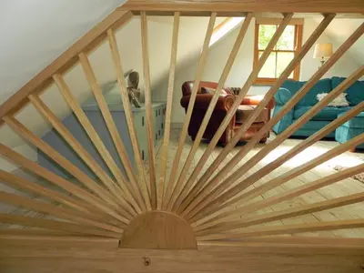 a room with a wooden staircase with a wooden ceiling at Neptunes Rest in St Austell