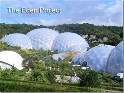 a group of domes in a field with trees at Sunflowers Barn in Looe